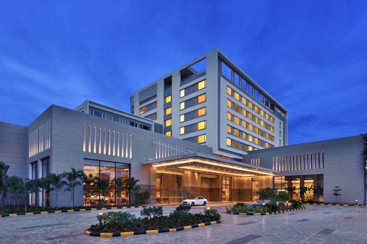 Courtyard by Marriott Madurai exterior at dusk